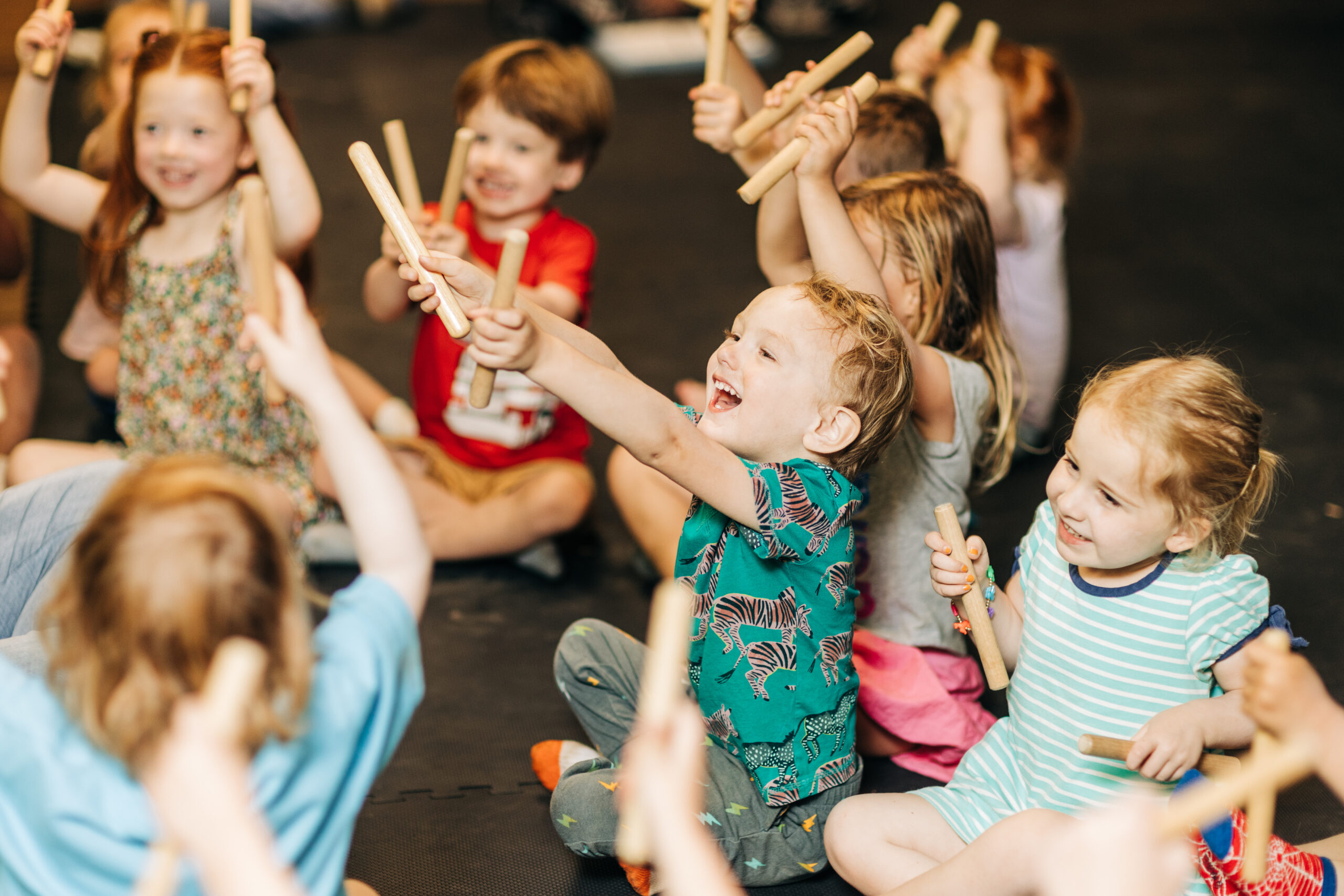 Child Development Center children excited to be making music in their enrichment class