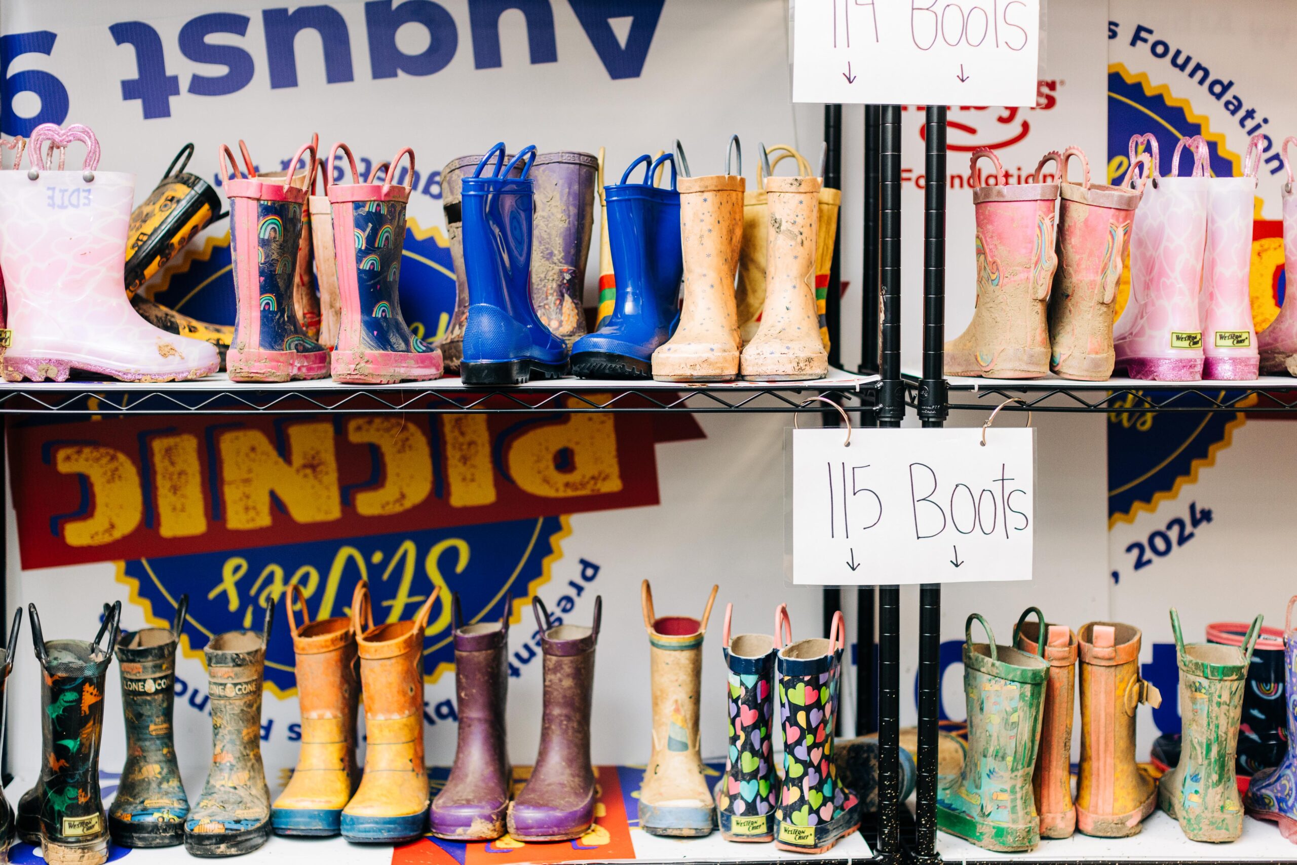 Muddy rain boots on a shelf